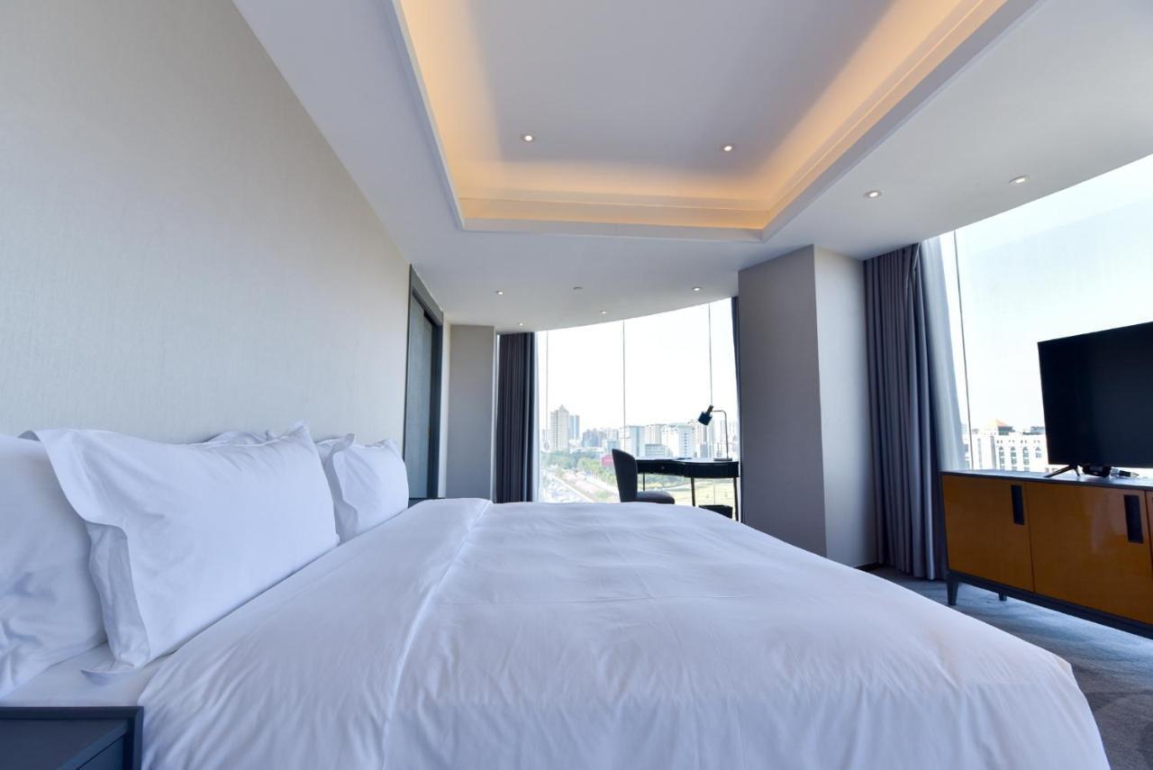 Ximala Business Hotel Гуанчжоу Экстерьер фото