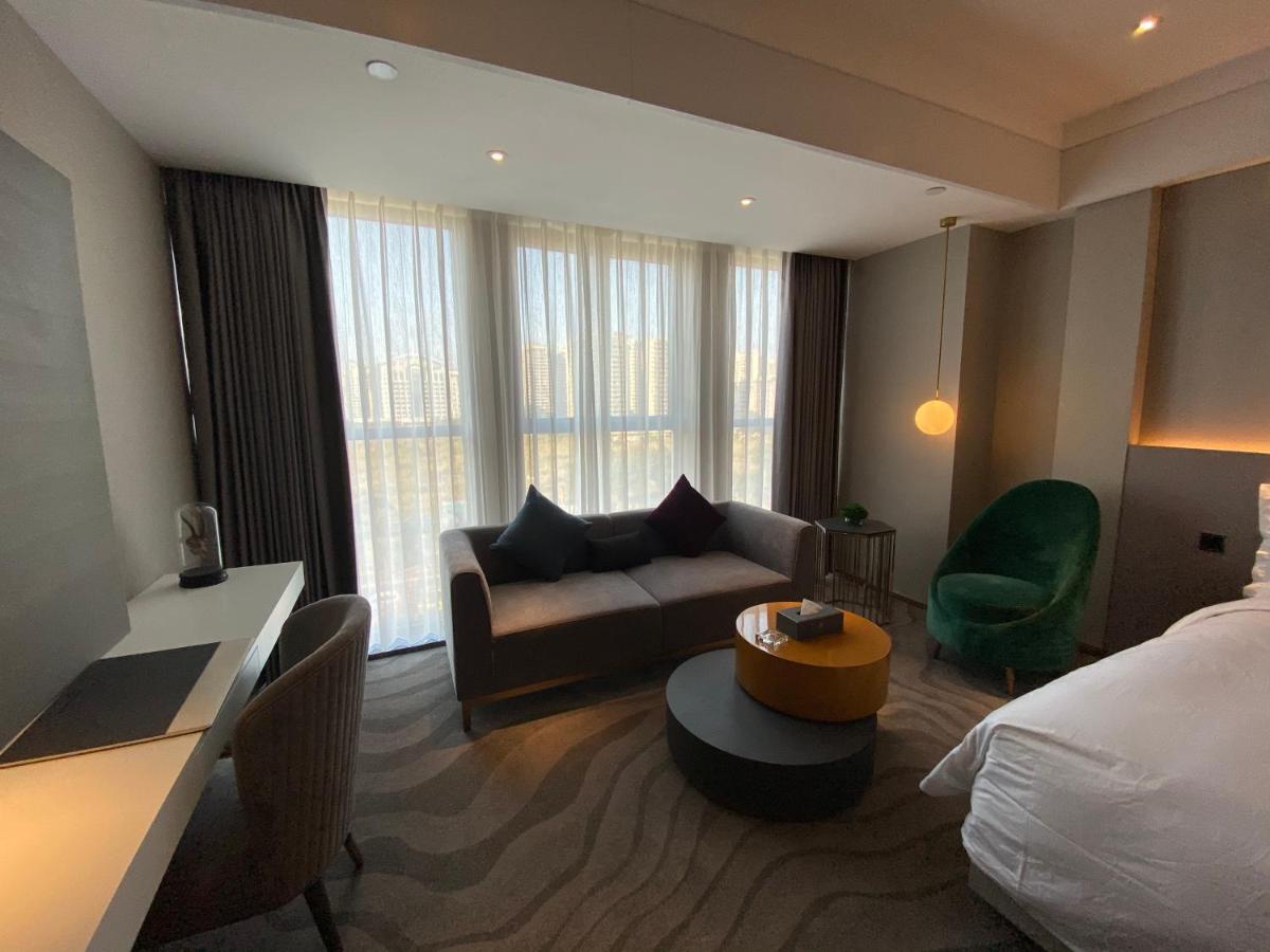 Ximala Business Hotel Гуанчжоу Экстерьер фото