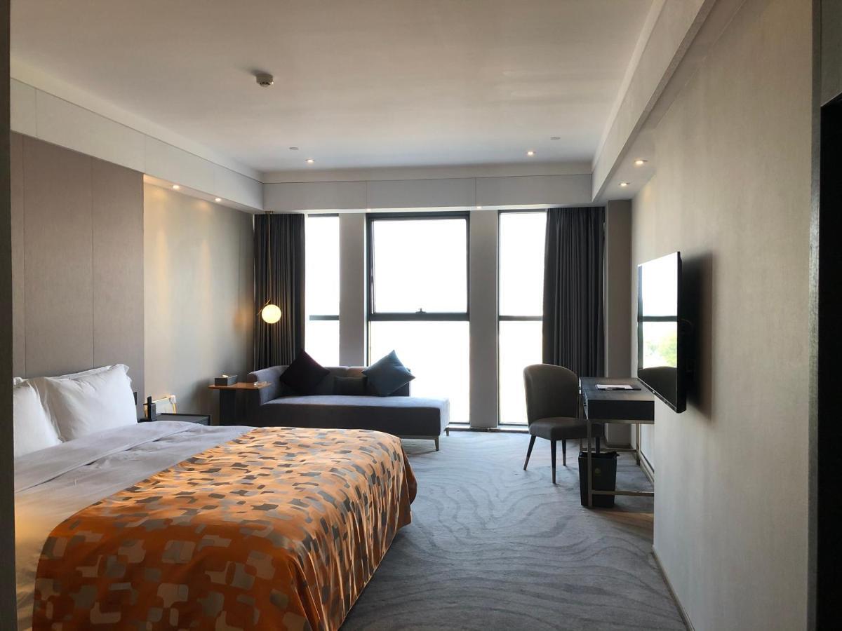 Ximala Business Hotel Гуанчжоу Экстерьер фото